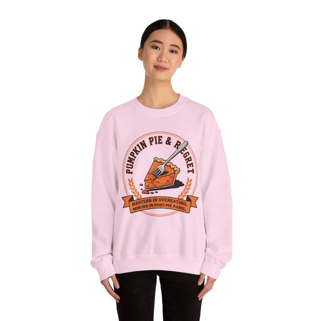Person wearing a Light Pink sweatshirt with a pumpkin pie graphic and text on a white background