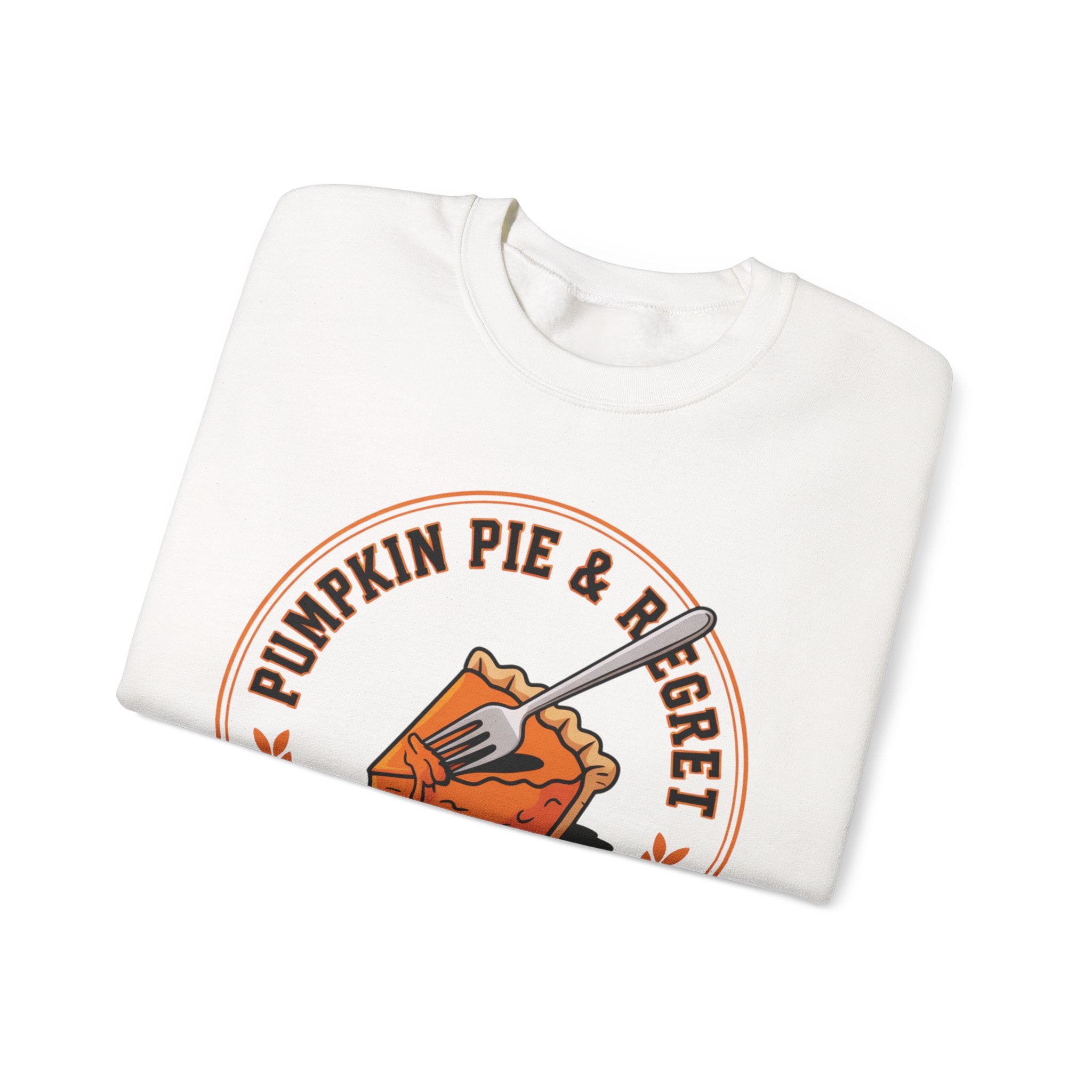 Folded White sweatshirt with 'Pumpkin Pie & Regret' design on a white background