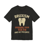 Black t-shirt with graphic of a tooth and text 'BRUXISM Grinding Your Teeth And My Patience'