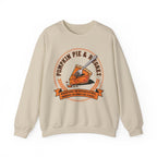 Beige sweatshirt with pumpkin pie graphic and text on a white background