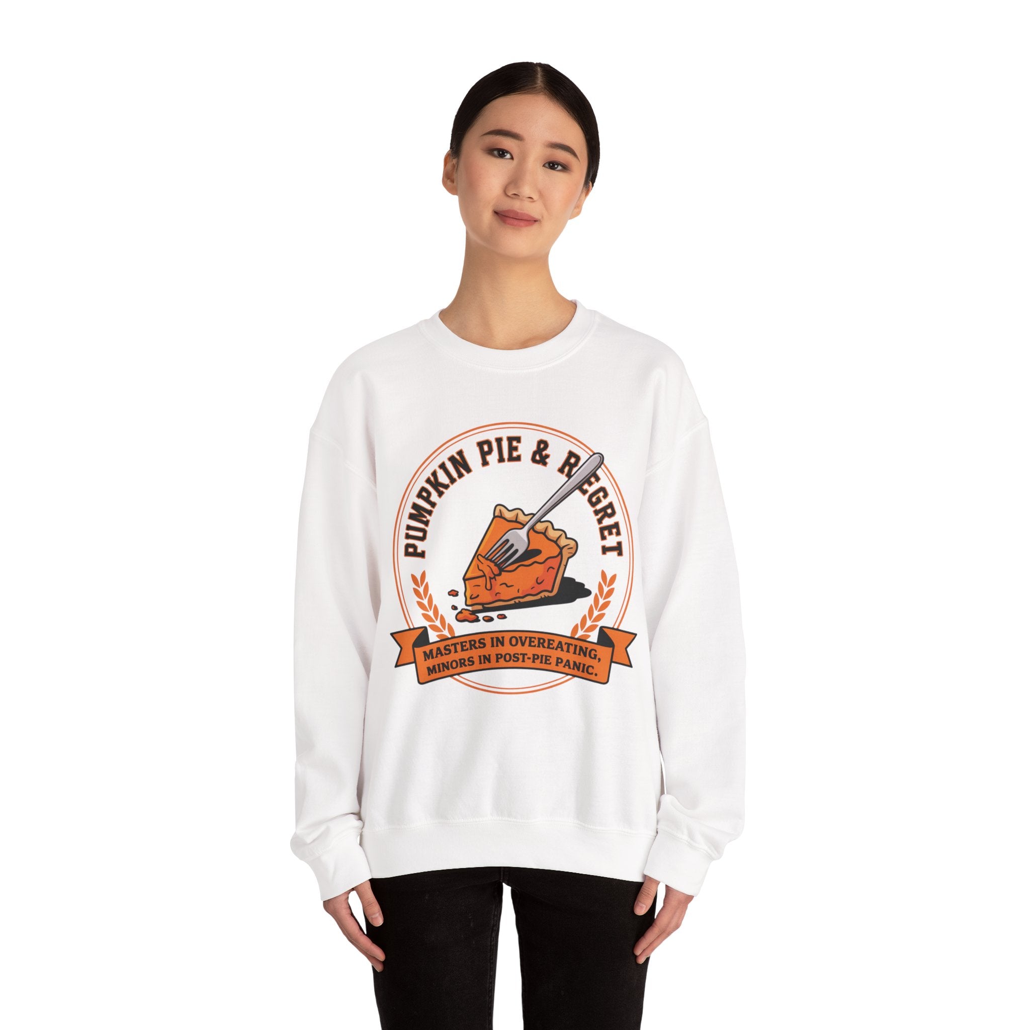 Person wearing a White sweatshirt with a pumpkin pie graphic and text on a white background