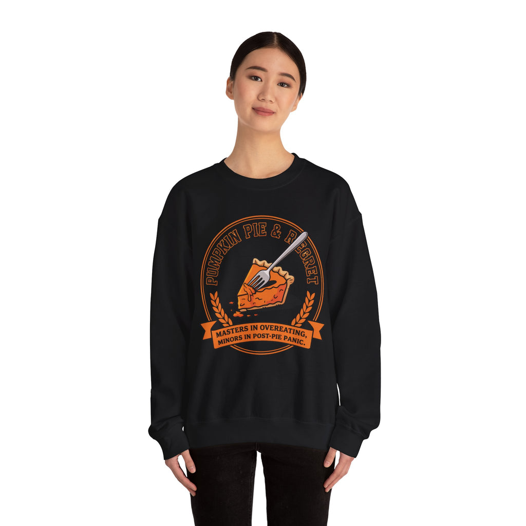Black sweatshirt with pumpkin pie graphic and text worn by a model on a white background