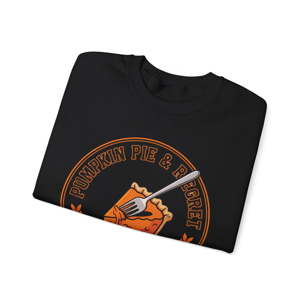 Folded Black sweatshirt with pumpkin pie and regret graphic on a white background
