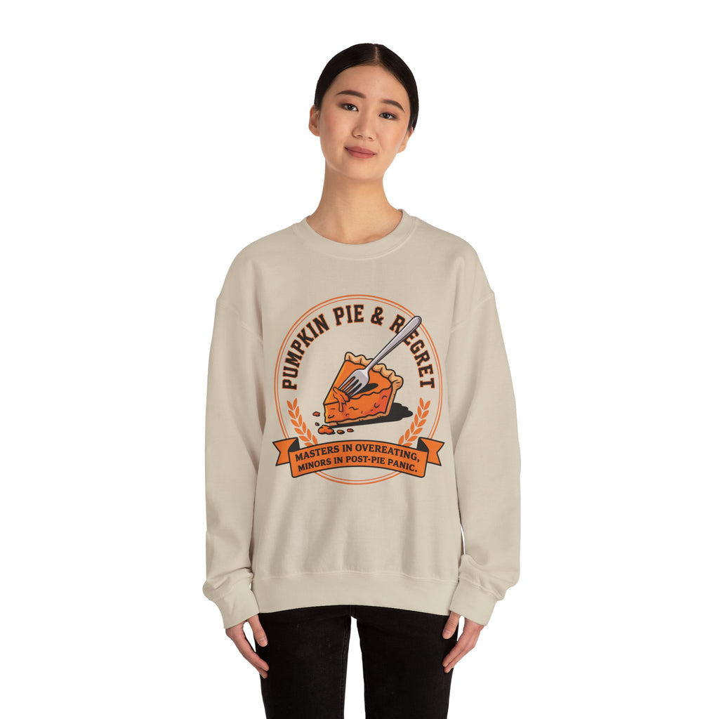 Person wearing a Beige sweatshirt with a pumpkin pie graphic and text on a white background